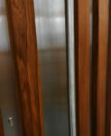 MIXT porte pivotante noyer inox design de luxe